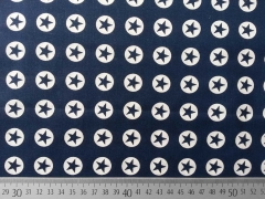 Baumwollstoff Sterne im Kreis 1,8 cm - weiss auf dunkelblau