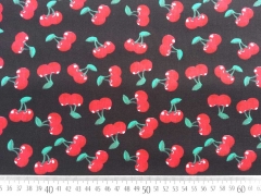 Baumwollstoff Kirschen, rot auf schwarz
