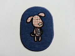 Flicken  oval, 9,5 x 7 cm, Hund auf Jeans