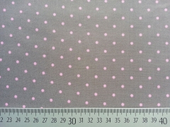 Kleine Punkte in rosa auf dunklem taupe