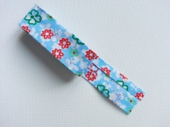 Schr�gband Bl�mchen als 2m-St�ck, hellblau-bunt