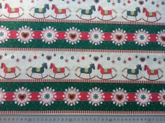 Baumwollstoff Weihnachtsbord�re Schaukelpferd, gr�n cremewei�