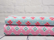 beschichteter Baumwollstoff Blumen, rosa