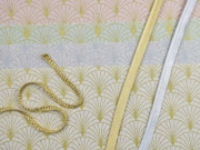 Dekostoff Gold Metallic Glitzer uni meliert, cremewei�