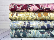 Viskosejersey abstraktes Blumenmuster, weinrot