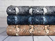 Baumwollstoff Schlangenmuster, braun