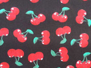 Baumwollstoff Kirschen, rot auf schwarz