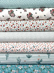 Baumwollstoff kleine Pfeilspitzen, petrol mint