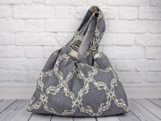 Dekostoff Ornamente grau melange/natur