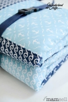 Baumwollstoff Anker & Sterne, dunkelblau auf grau