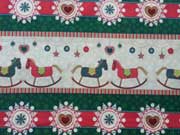 Baumwollstoff Weihnachtsbord�re Schaukelpferd, gr�n cremewei�